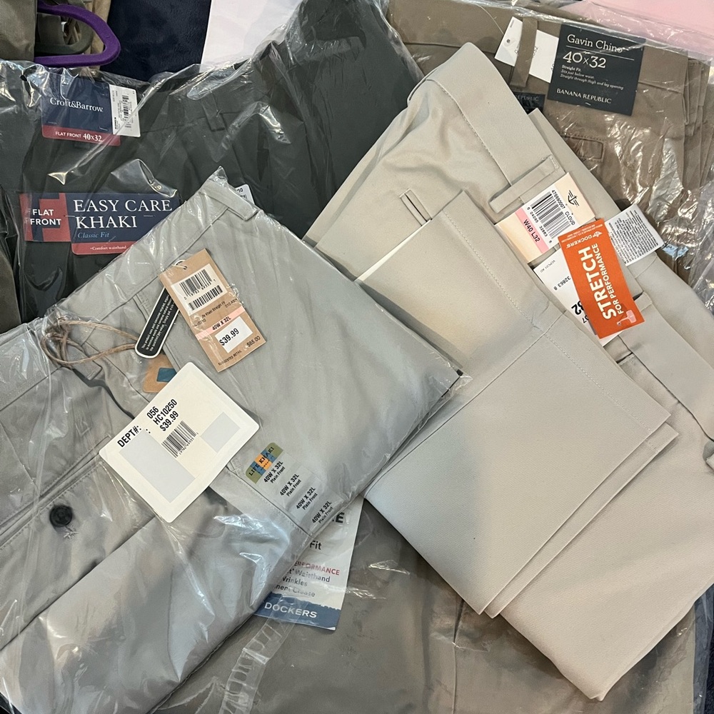 Men’s clothes. Many new with tags.  XXL and 40x32 pants